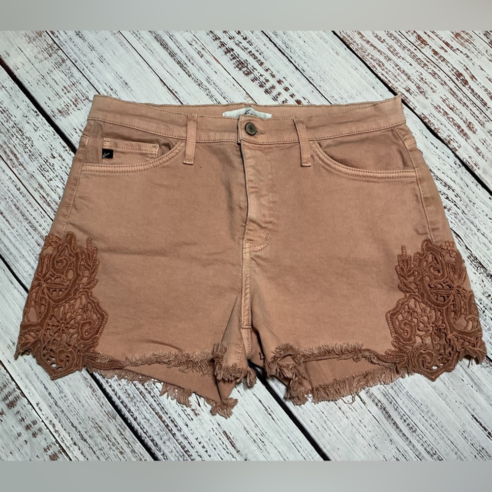 Kancan rose blush pink denim shorts with lace details and a frayed hem. Size 30.